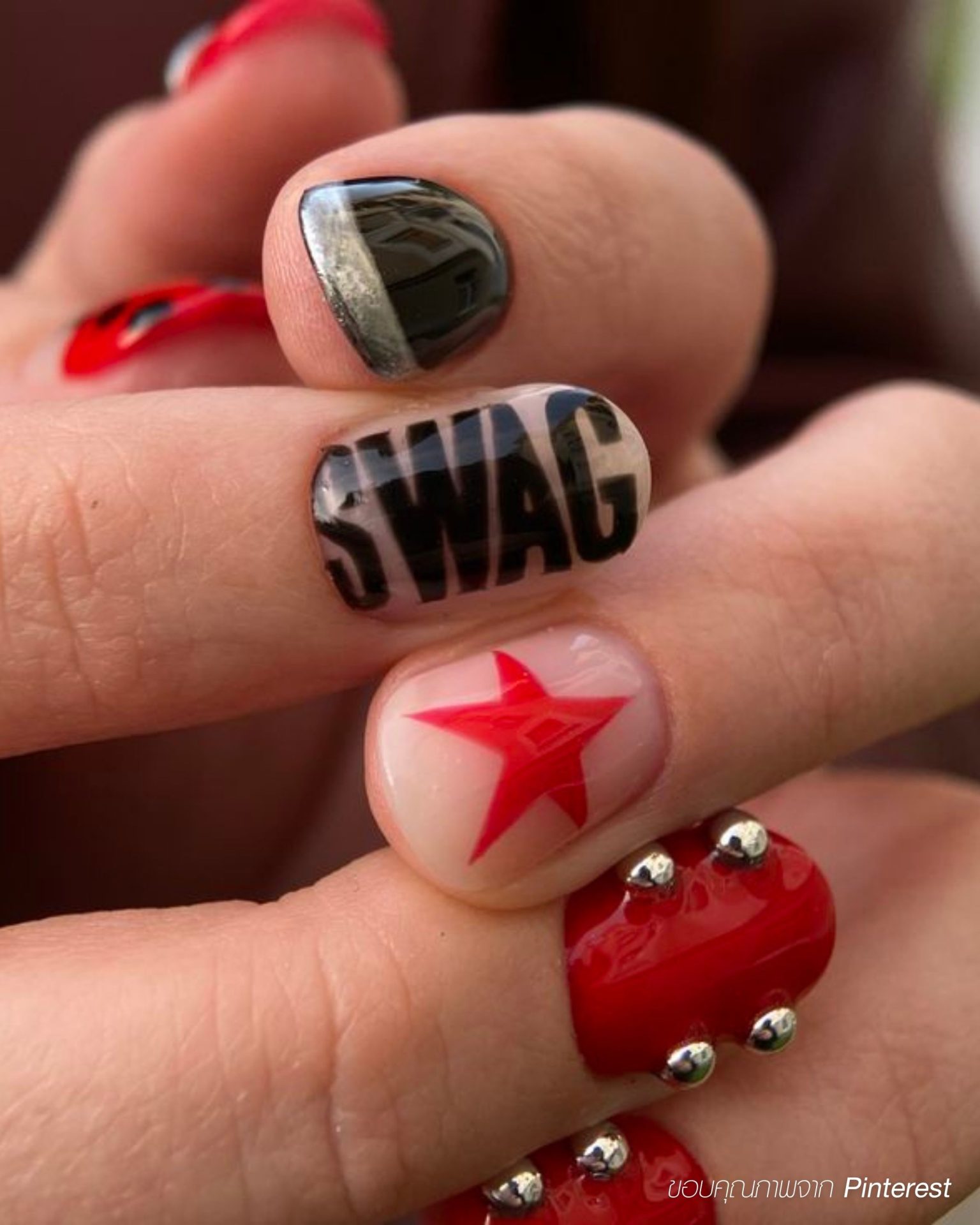 SWAG style men's nails with red stars and silver studs