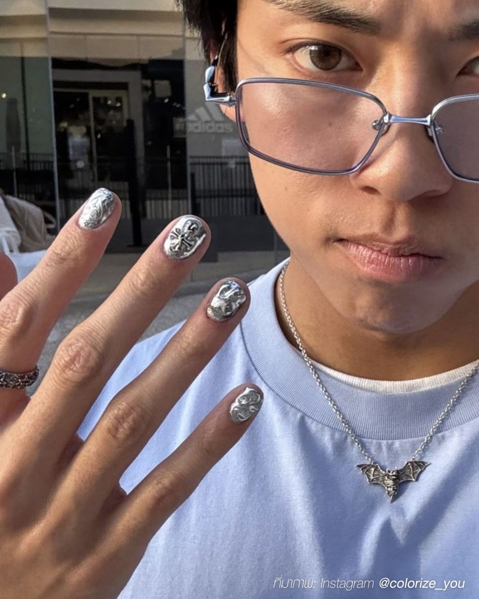 Review of chic streetwear men's look with embossed silver nails and rings