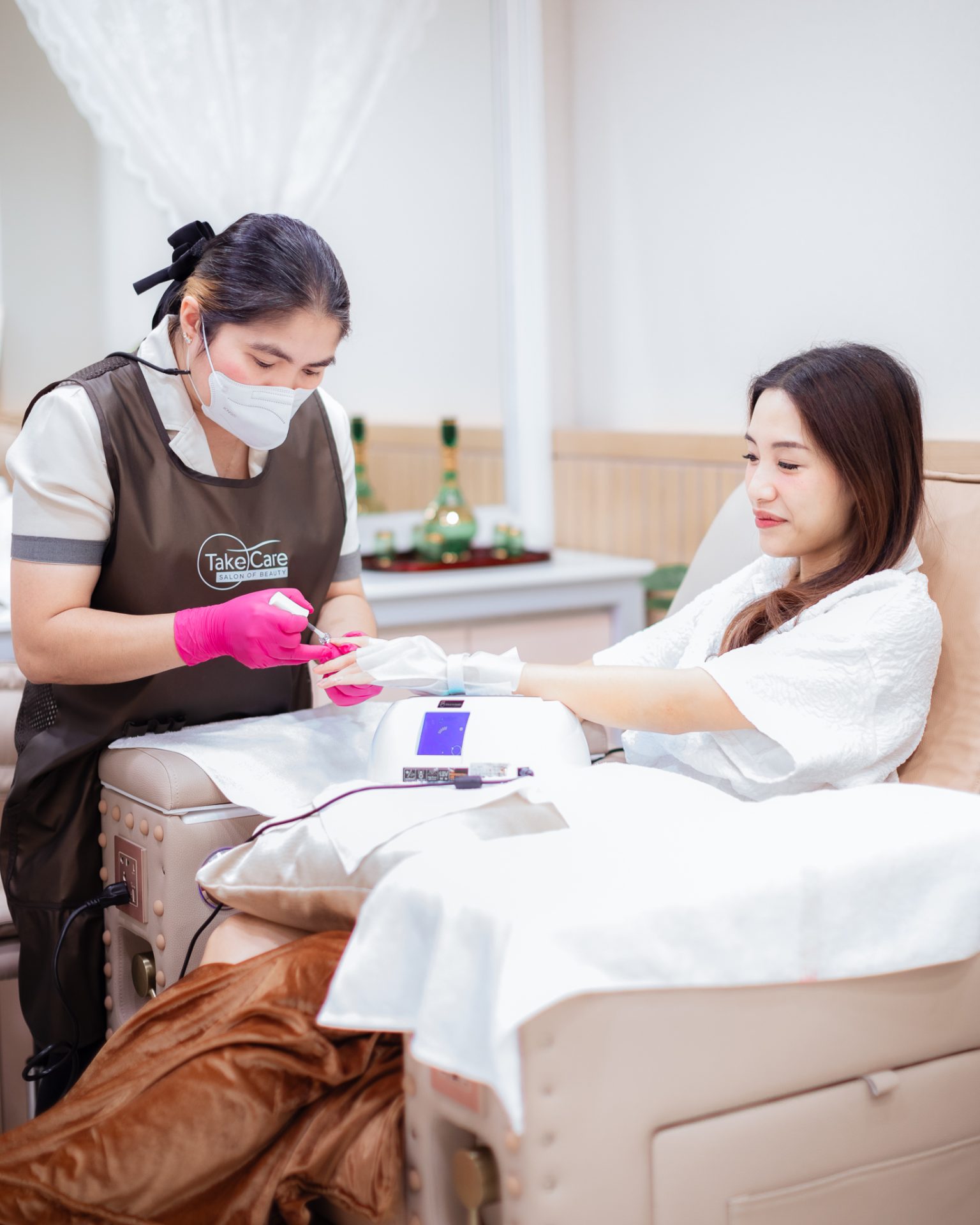 Nail bed preparation process performed meticulously by expert technicians