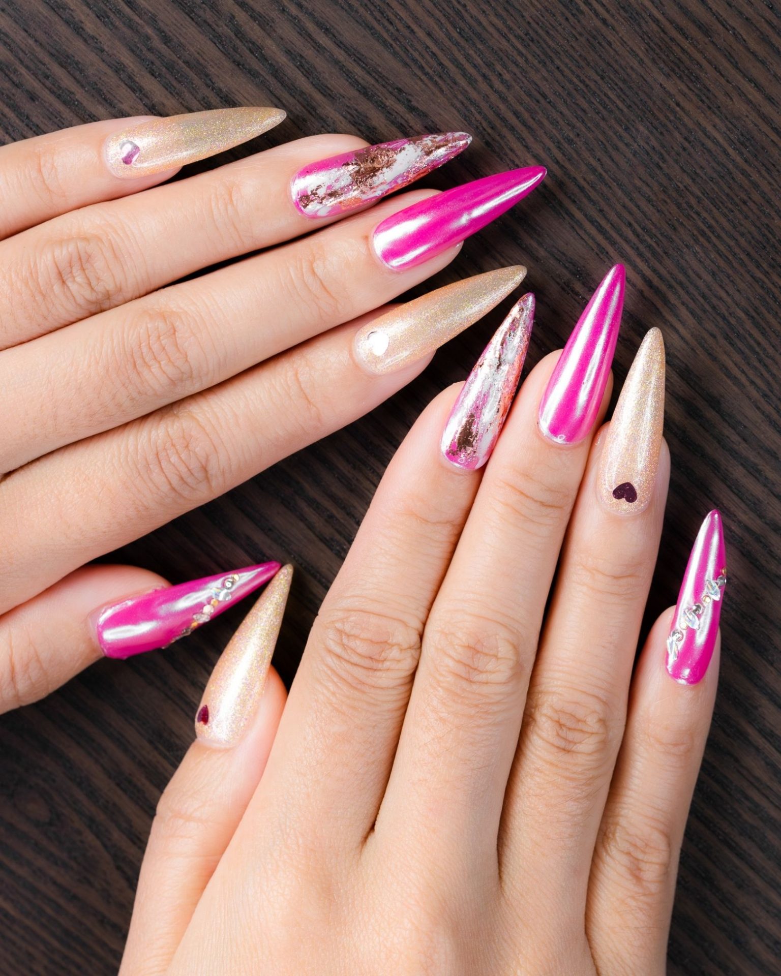 Metallic magenta pink nail art with foil work