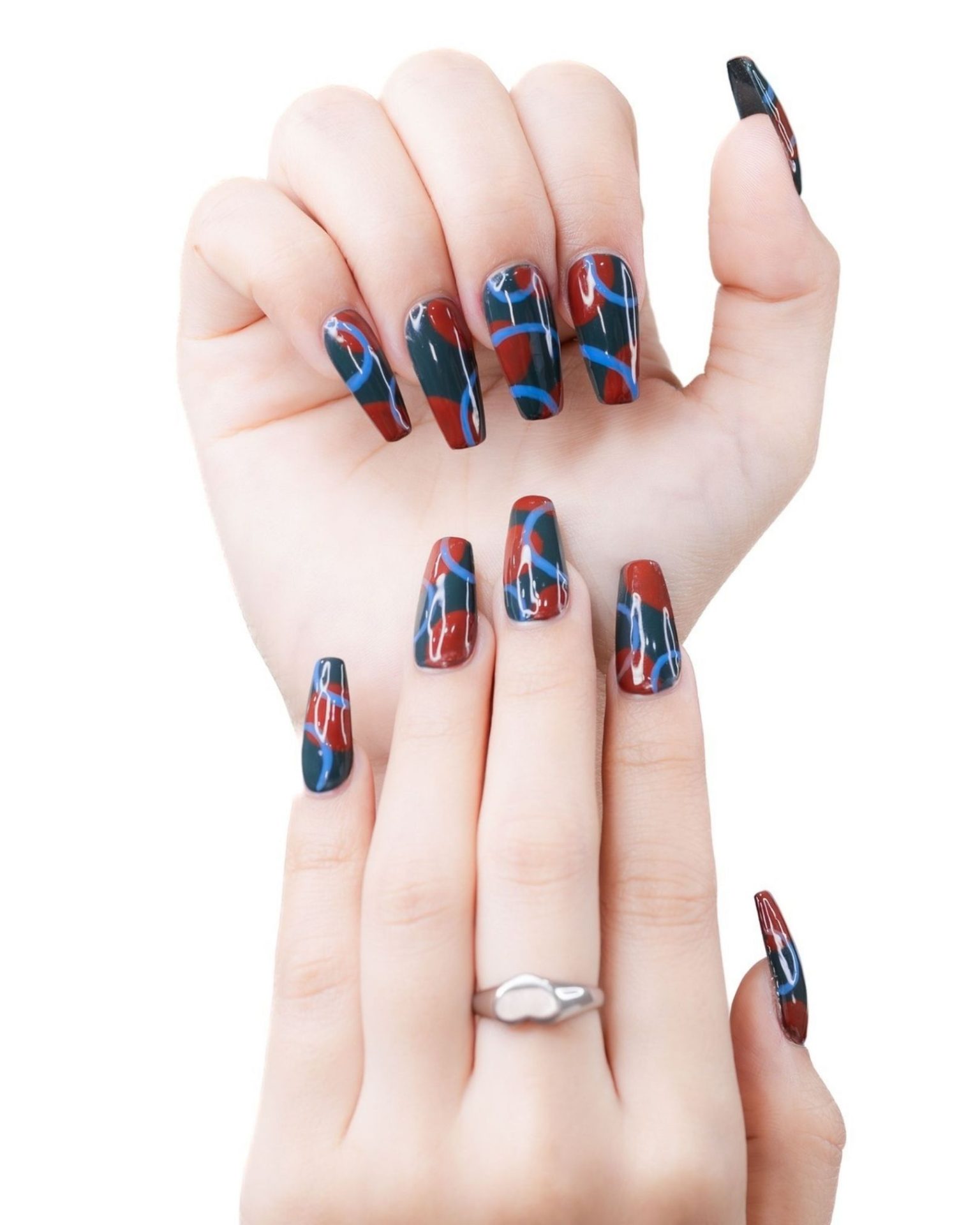Long nails with abstract curved line art in red and blue tones