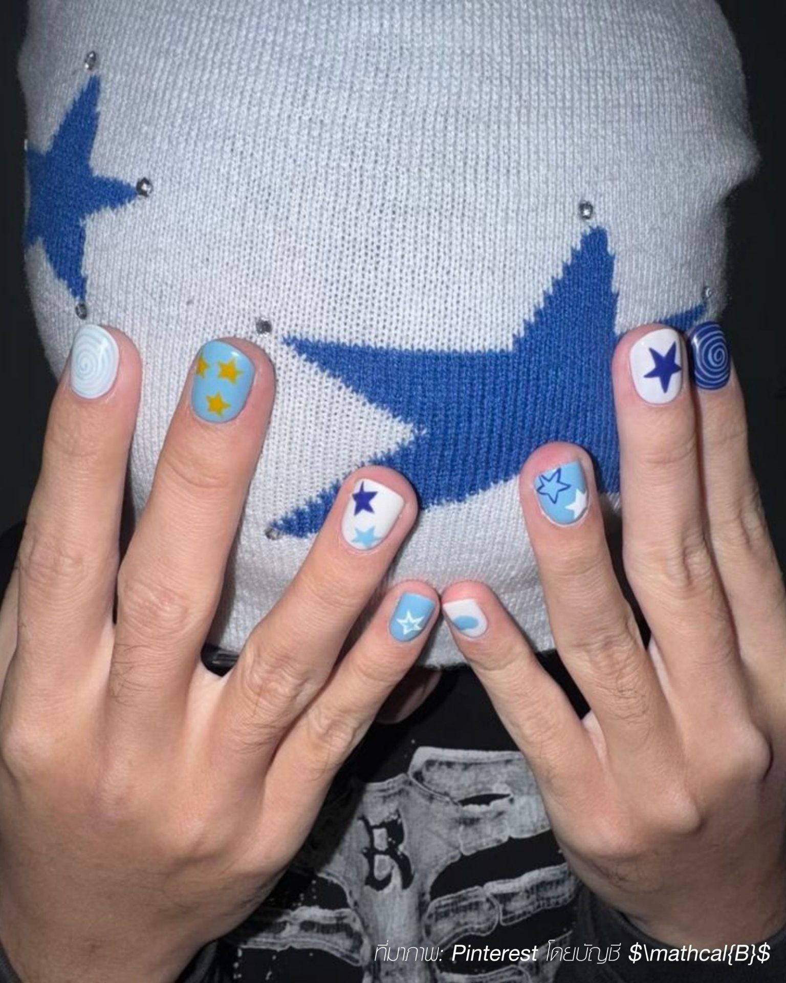 Bright blue and white men's nails with stars and spiral designs