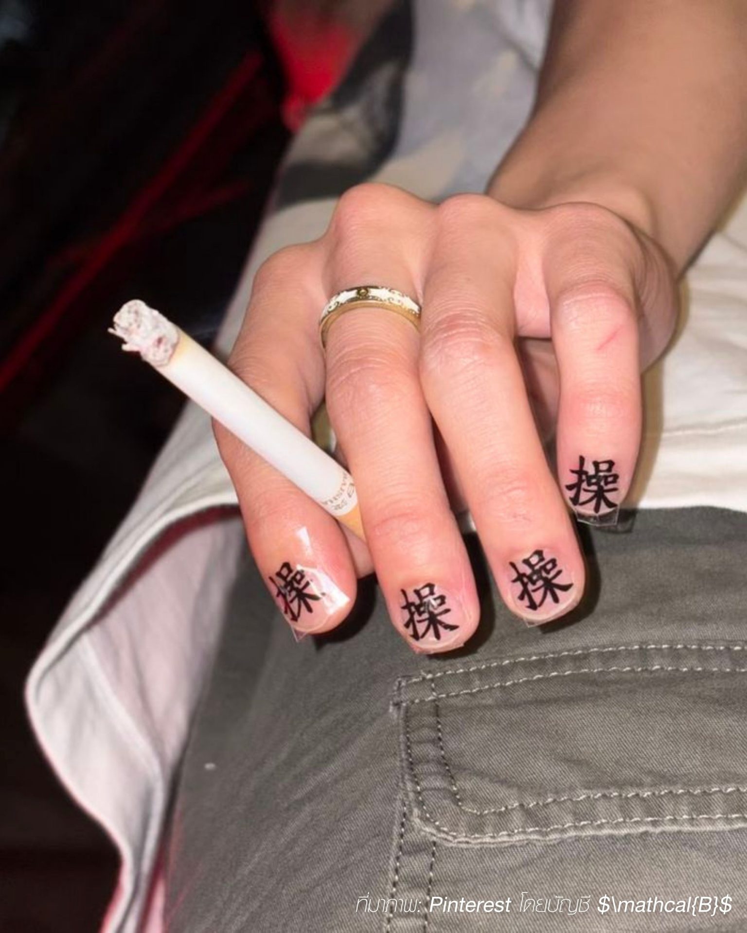 Minimalist men's style with cool Chinese characters painted on clear nails