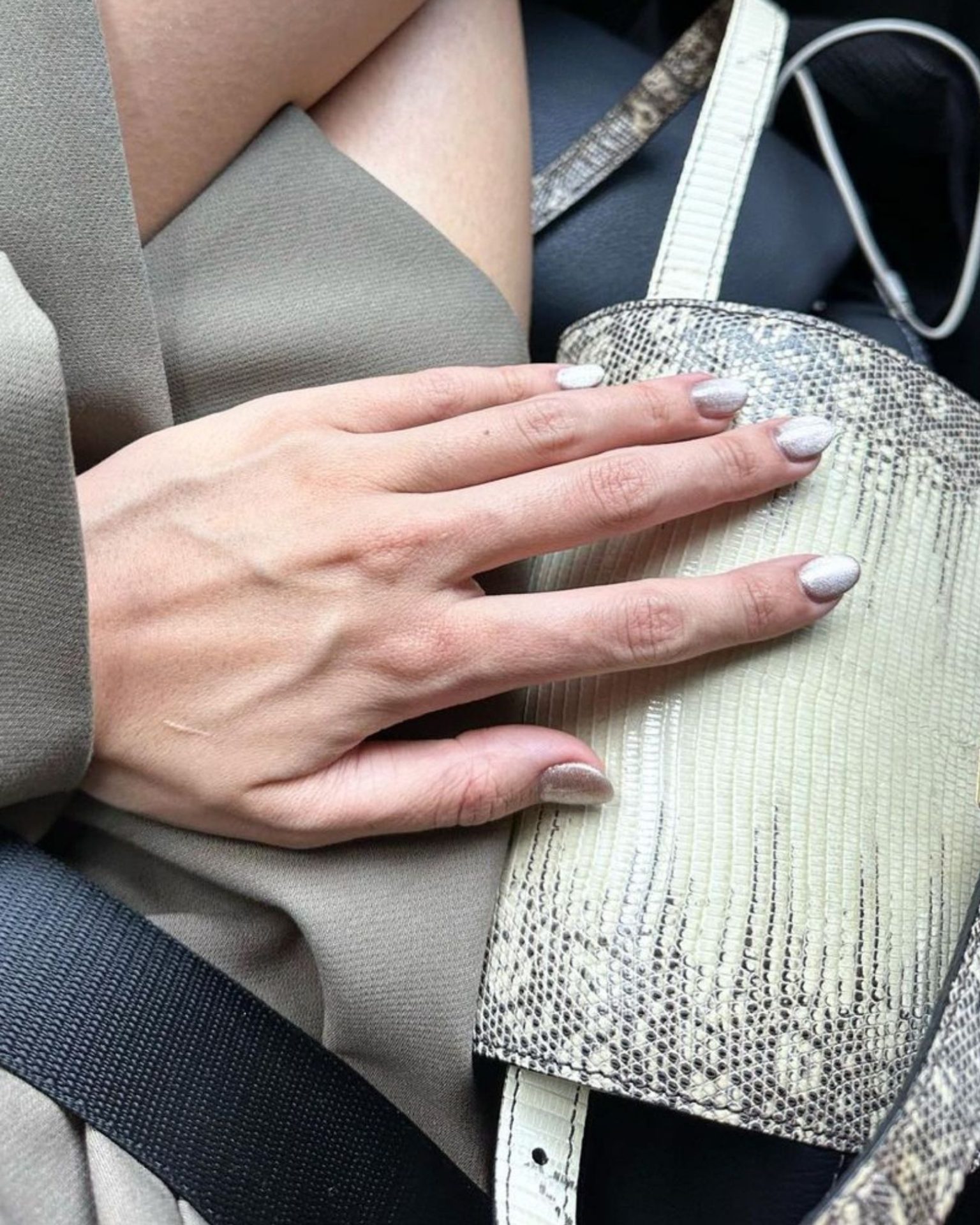 Short nails in elegant metallic silver