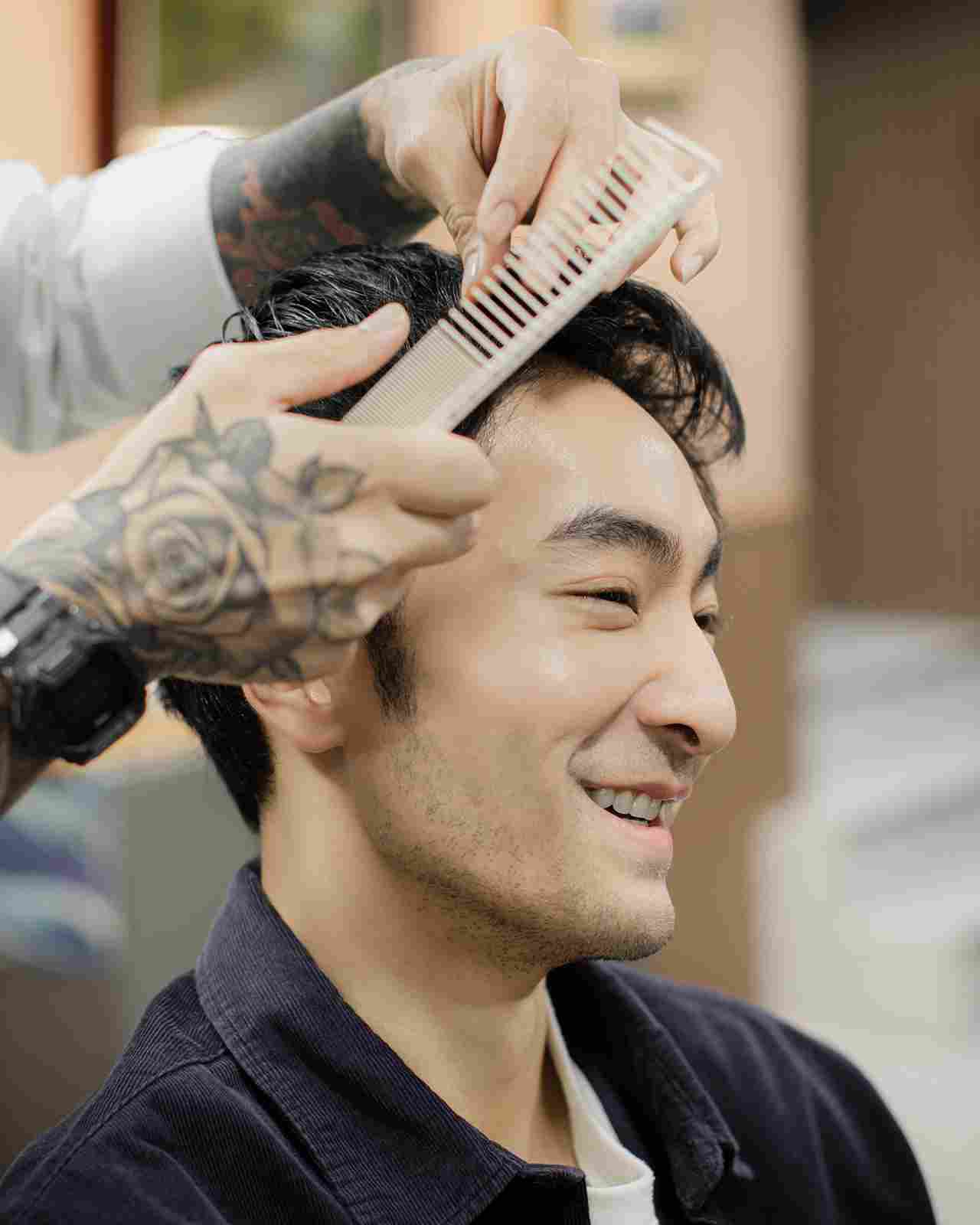 Satisfied client after a men's grooming service at One Man Club, Bangkok