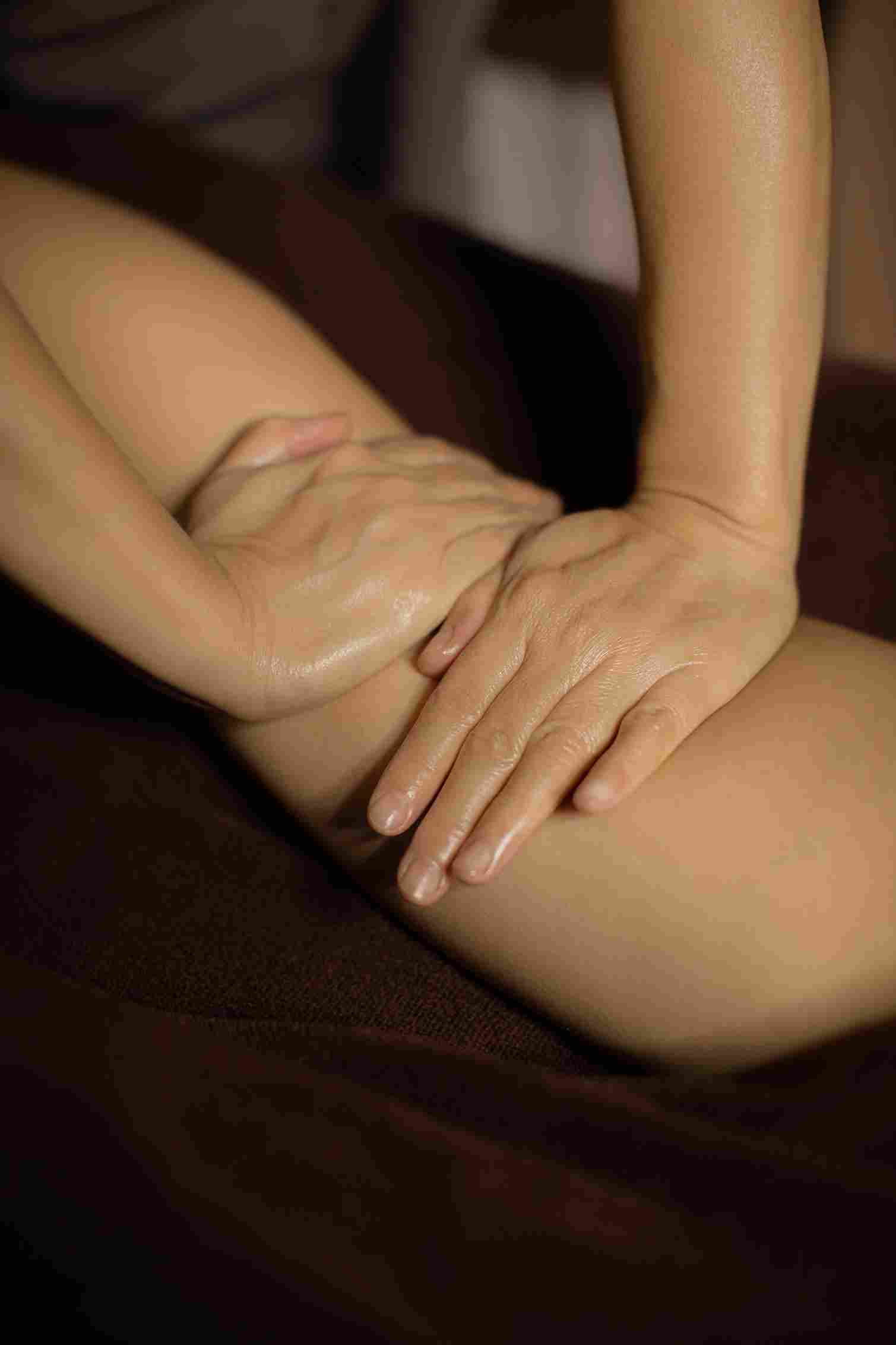 Deep tissue myofascial release on tight thigh muscles for IT band syndrome