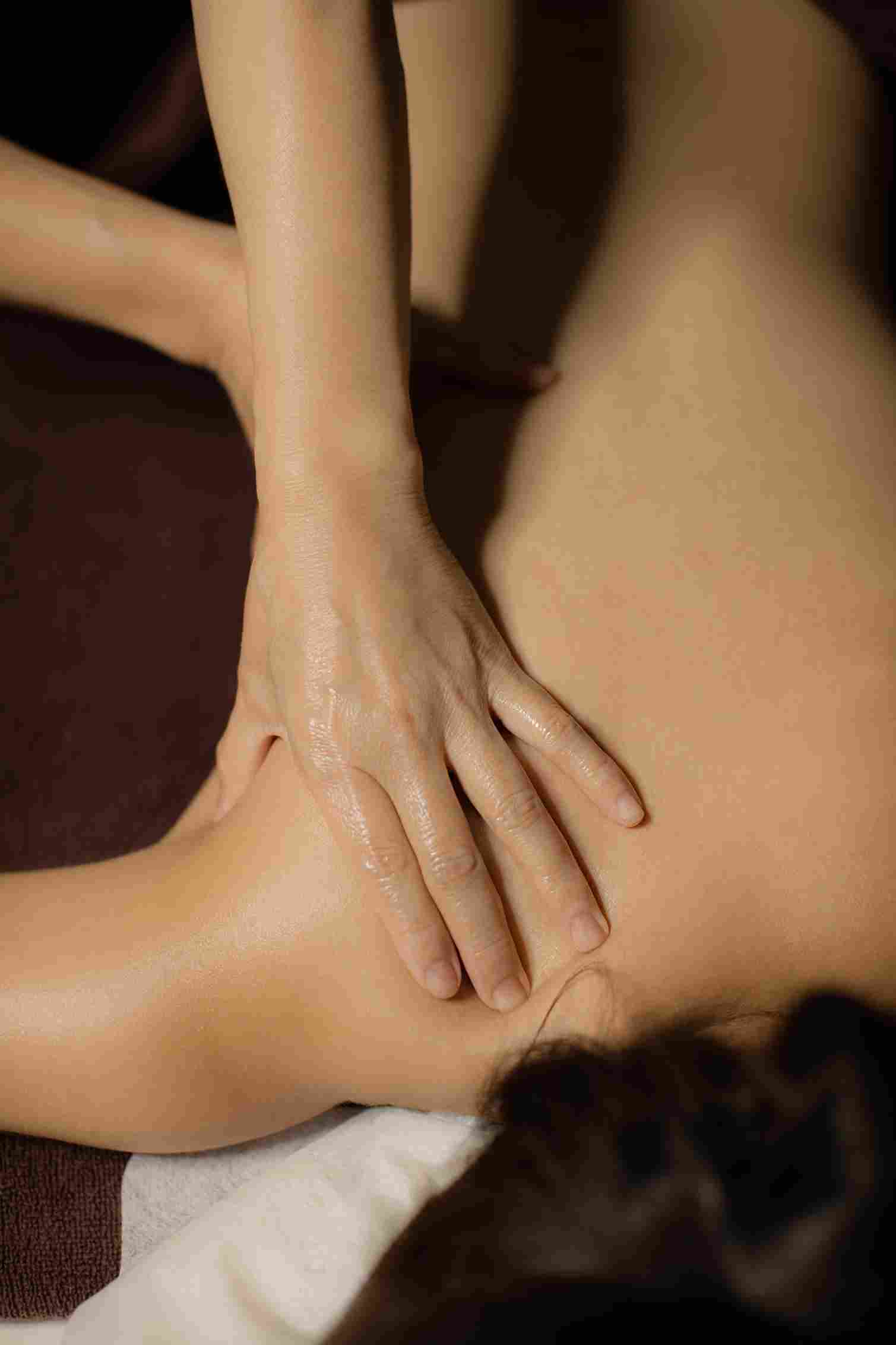 Flushing strokes on the neck and shoulders to clear metabolic waste after training